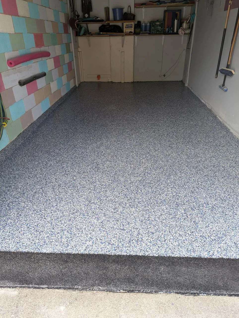 Garage floor coating with storage cabinets