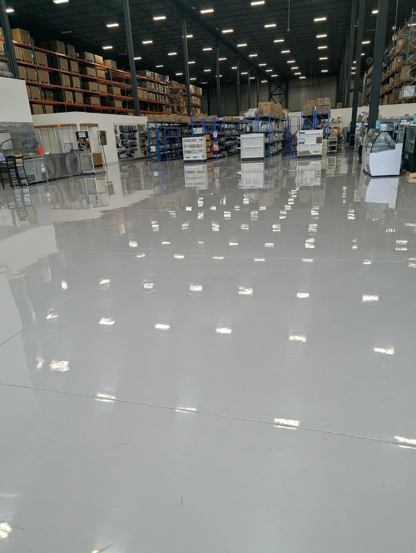 Finished glossy warehouse epoxy floor in the GTA